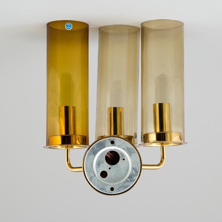 A brass wall lamp by HANS-AGNE JAKOBSSON, Markaryd.