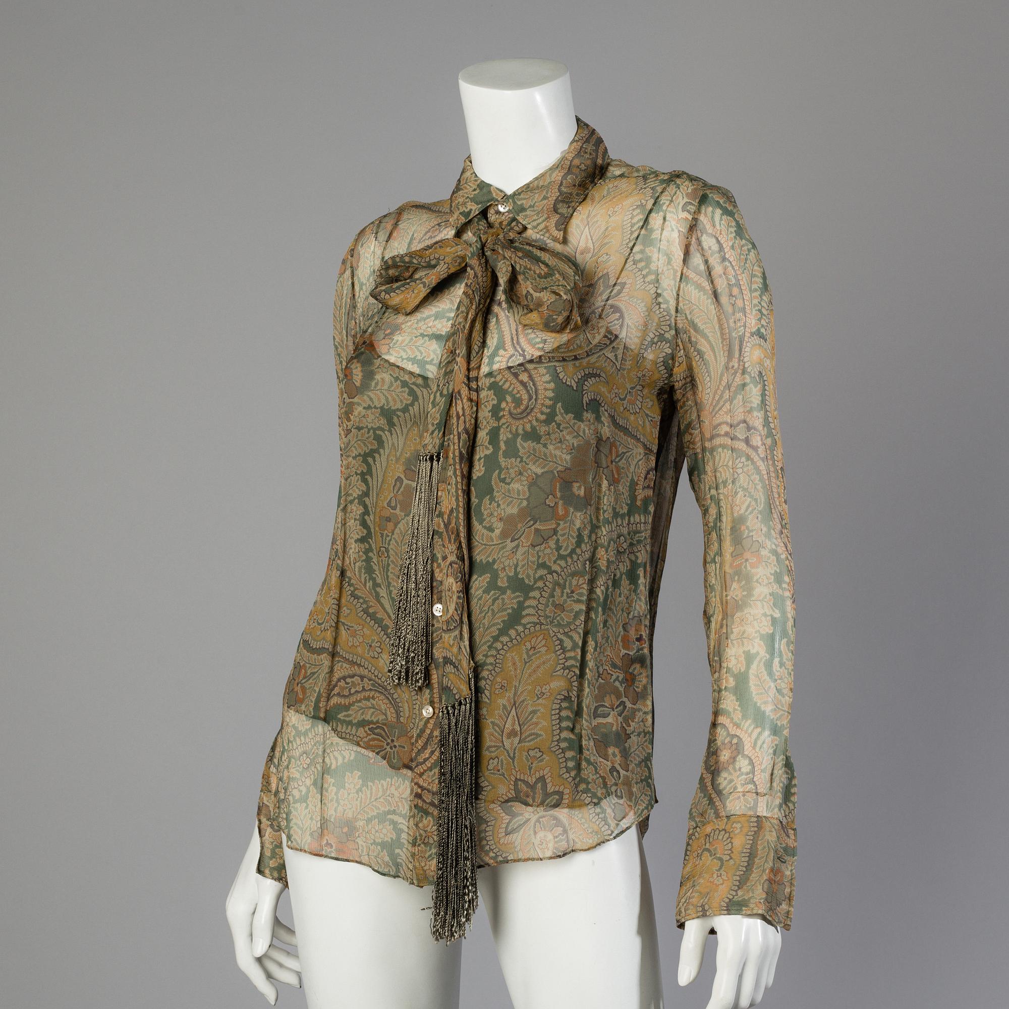 Jacket and blouse by Ralph Lauren.