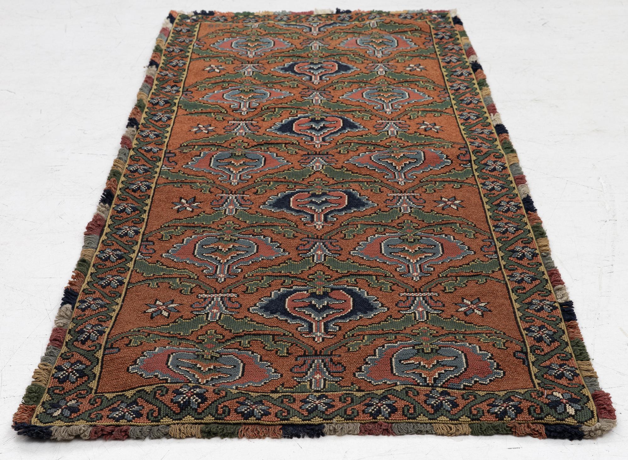 Sled cushion in folk art style, 20th century. 155 x 70 cm.