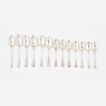 A set of thirteen Swedish silver spoons, including Gustaf Folcker, Stockholm 1825.