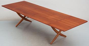 A Hans J Wegner teak and oak sabre leg dinner table by Andreas Tuck, Denmark 1950-60's.