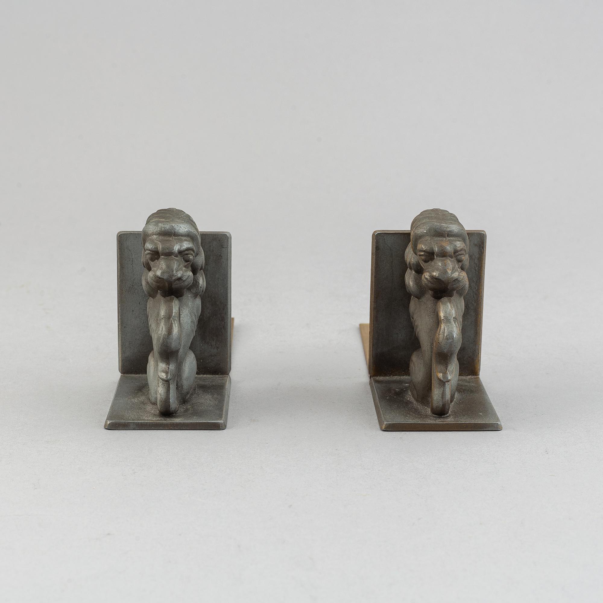 A pair of brass book ends, Stjärnmetall, 1930's.