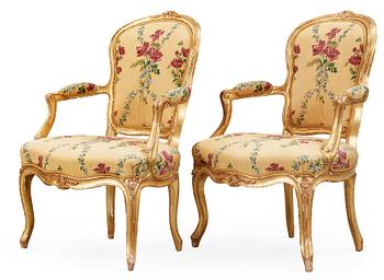 473. A pair of Louis XV 18th century armchairs, possibly by Claude-Etienne Michard.
