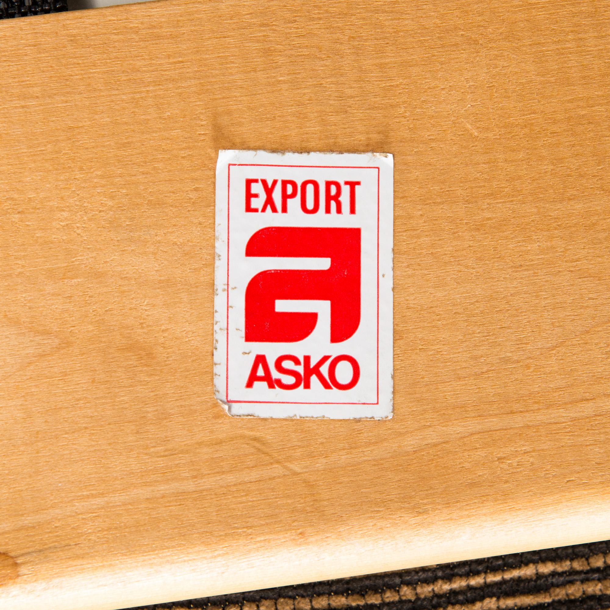 Esko Pajamies, A pair of 1970's 'Bonanza' armchairs, coffee table and sofa for Asko.