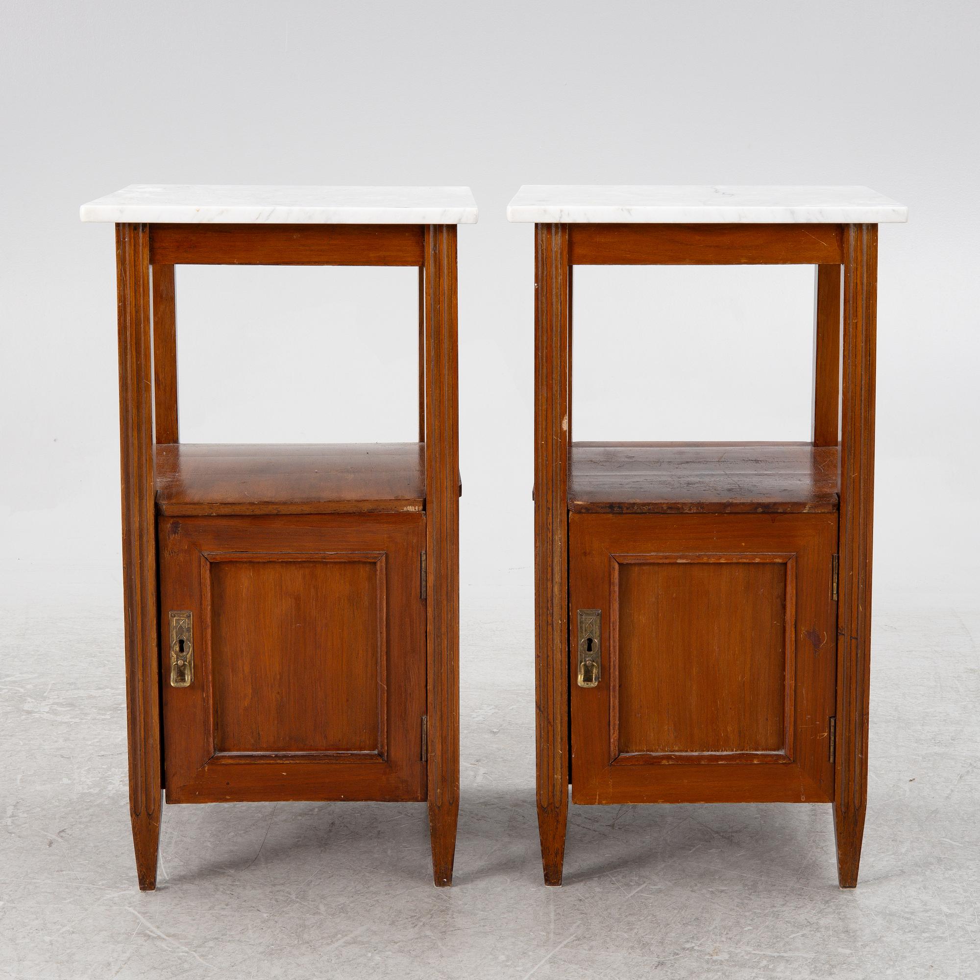 A pair of bedside tables, early 20th century.
