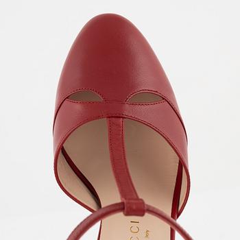 Gucci, a pair of red leather high heel shoes, 2016, size 37.