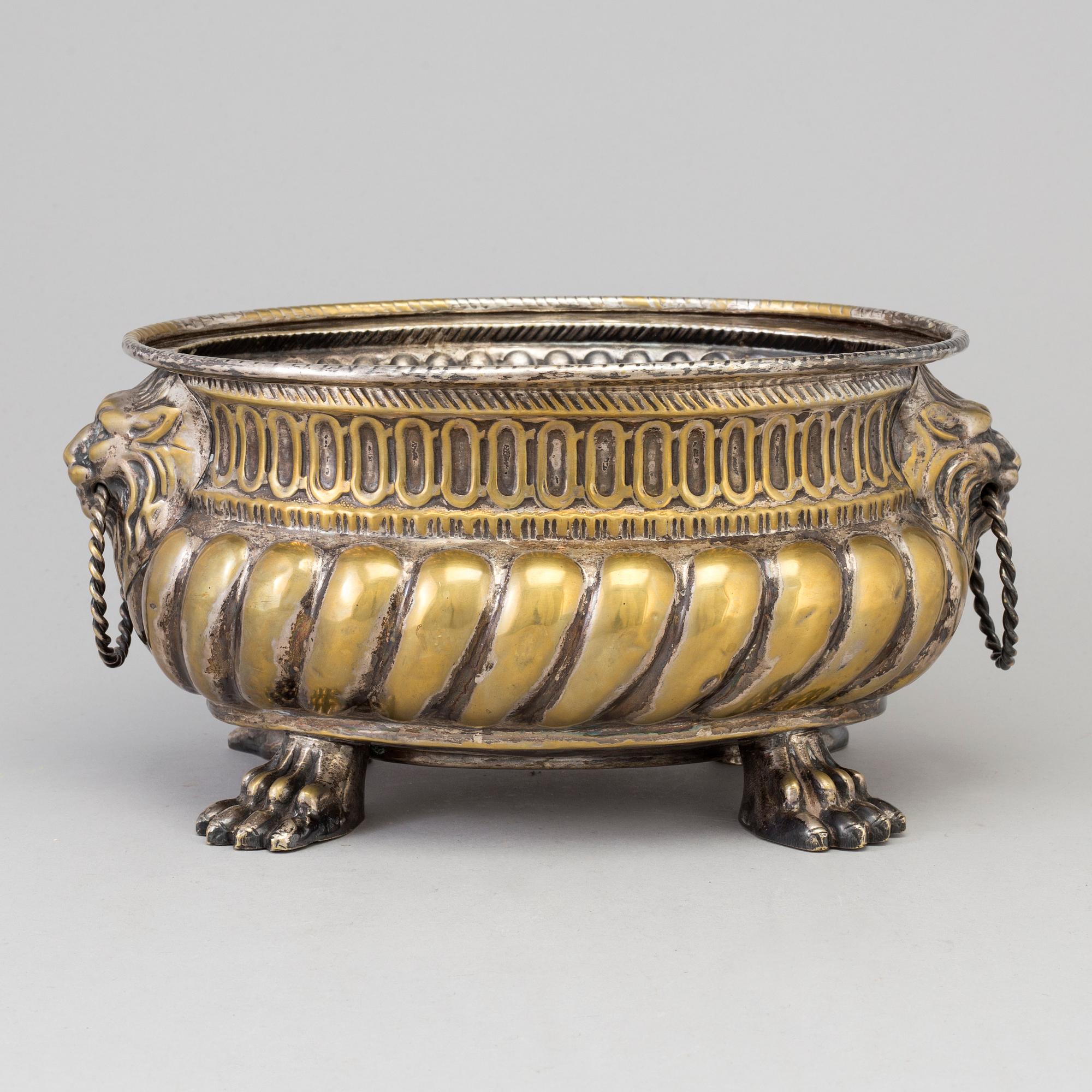 A 19th century brass flower pot.