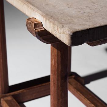 Axel Einar Hjorth, a stained pine and limestone top "Sandhamn" table, Nordiska Kompaniet, Sweden 1931.