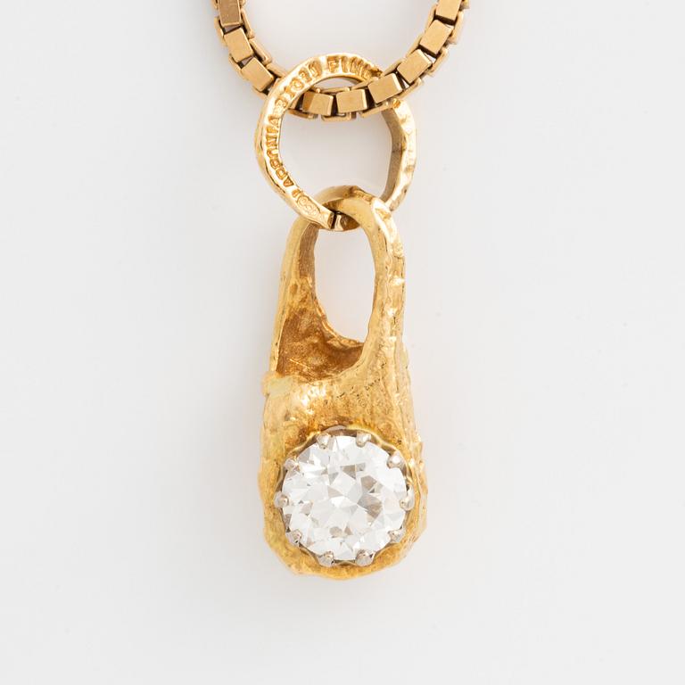 Lapponia hänge 18K guld med en rund briljantslipad diamant.