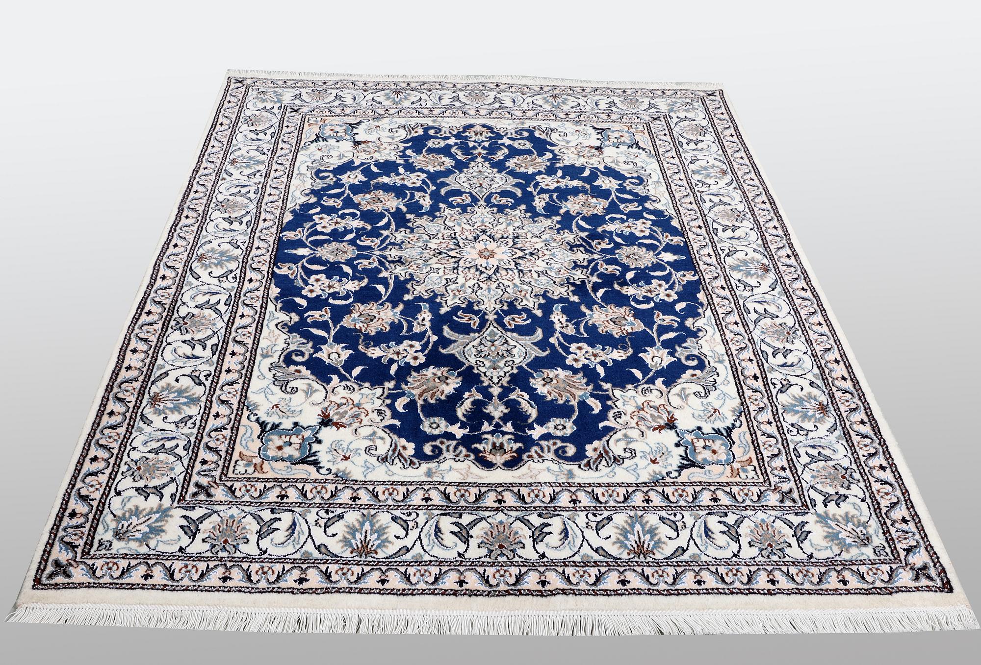 A carpet, Nain, part silk, ca 205 x  152 cm.