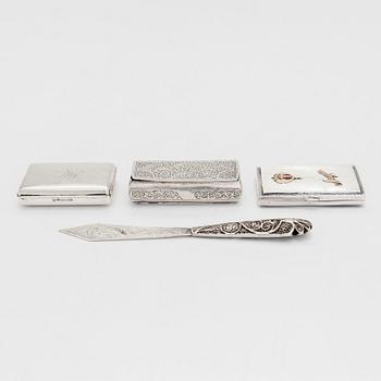 Three silver boxes and a letter opener in filigree, first half of the 20th century and second half of the 19th century.