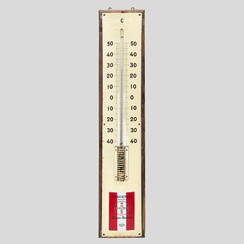 a mid-20th century outdoor thermometer.