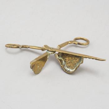 A 17th/18th century bronze candle scissors.