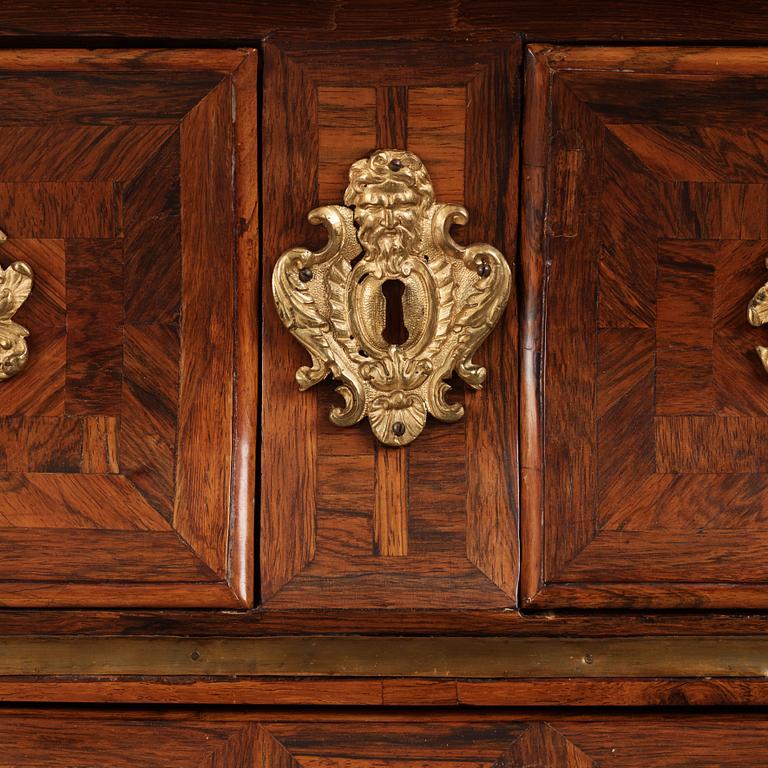 A Swedish early rococo parquetry, ormolu-mounted and marble commode, presumably by S. Pasch or J. Wulf , ca. 1740.