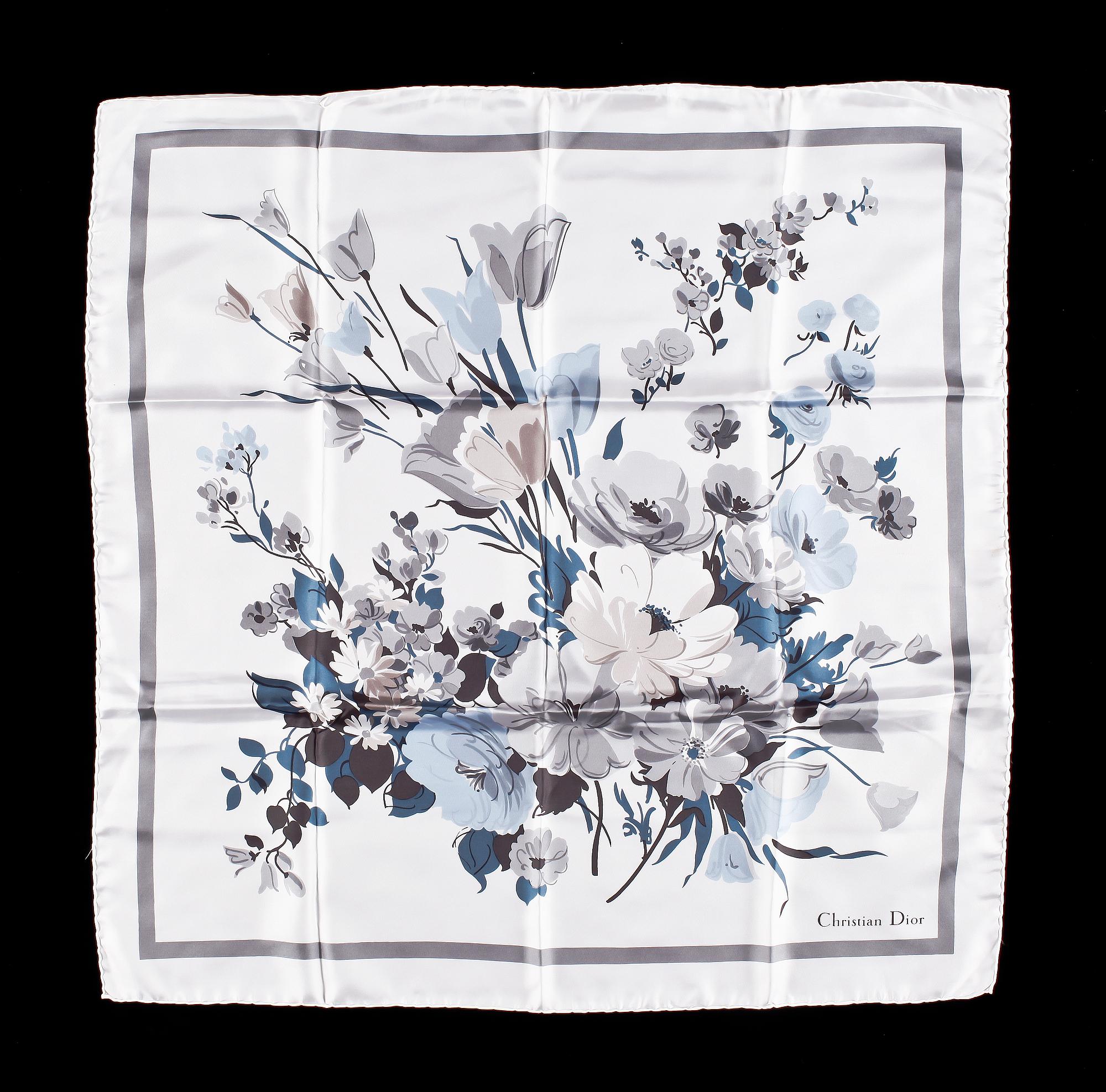 A set of three scarves by Christian Dior, Emilio Pucci and Yves Saint Laurent.
