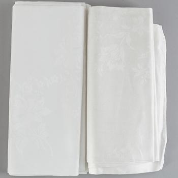 Seven table cloths and 26 napkins, mostly linen, first half of the 20th Century.