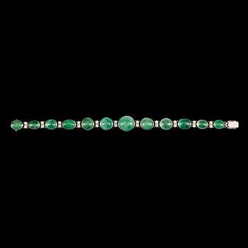 A cultured pearl and cabochon-cut green beryl bracelet.