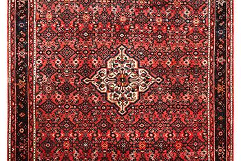 A carpet, Hosseinabad, c. 303 x 218 cm.