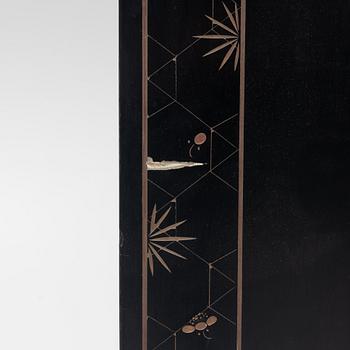 A Chinese lacquer folding screen, 20th century.