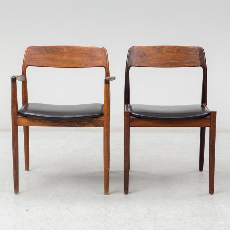 A Danish rosewood dining table, six chairs and a pair of armchairs, 1950's/60's.