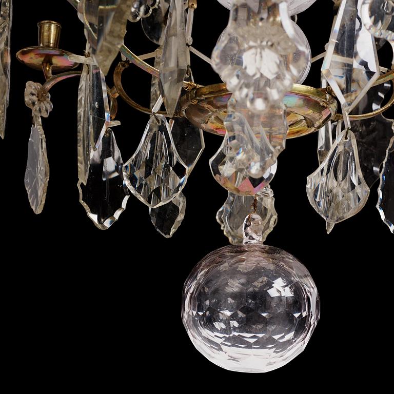 A Swedish rococo gilt-brass and cut glass six-branch chandelier by O. Westerberg (master in Stockholm 1769-1811).