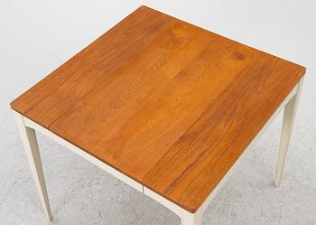 A dining table, mid-20th century.