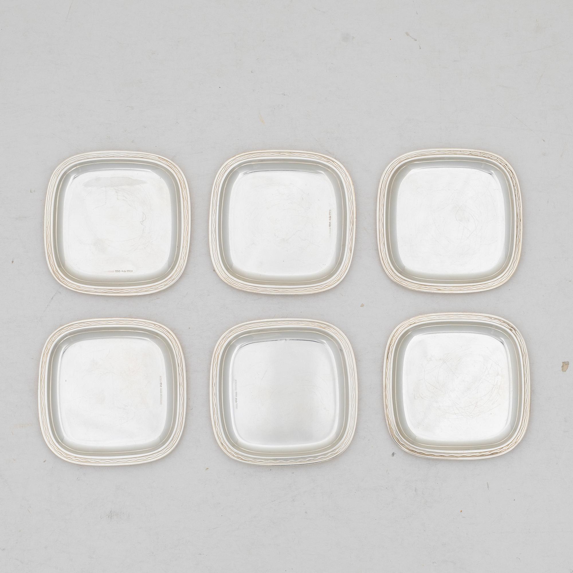 C.G. Hallberg, Coasters / ashtrays, 6 pcs, sterling silver, design by Gustaf Janson, Stockholm 1955-57.