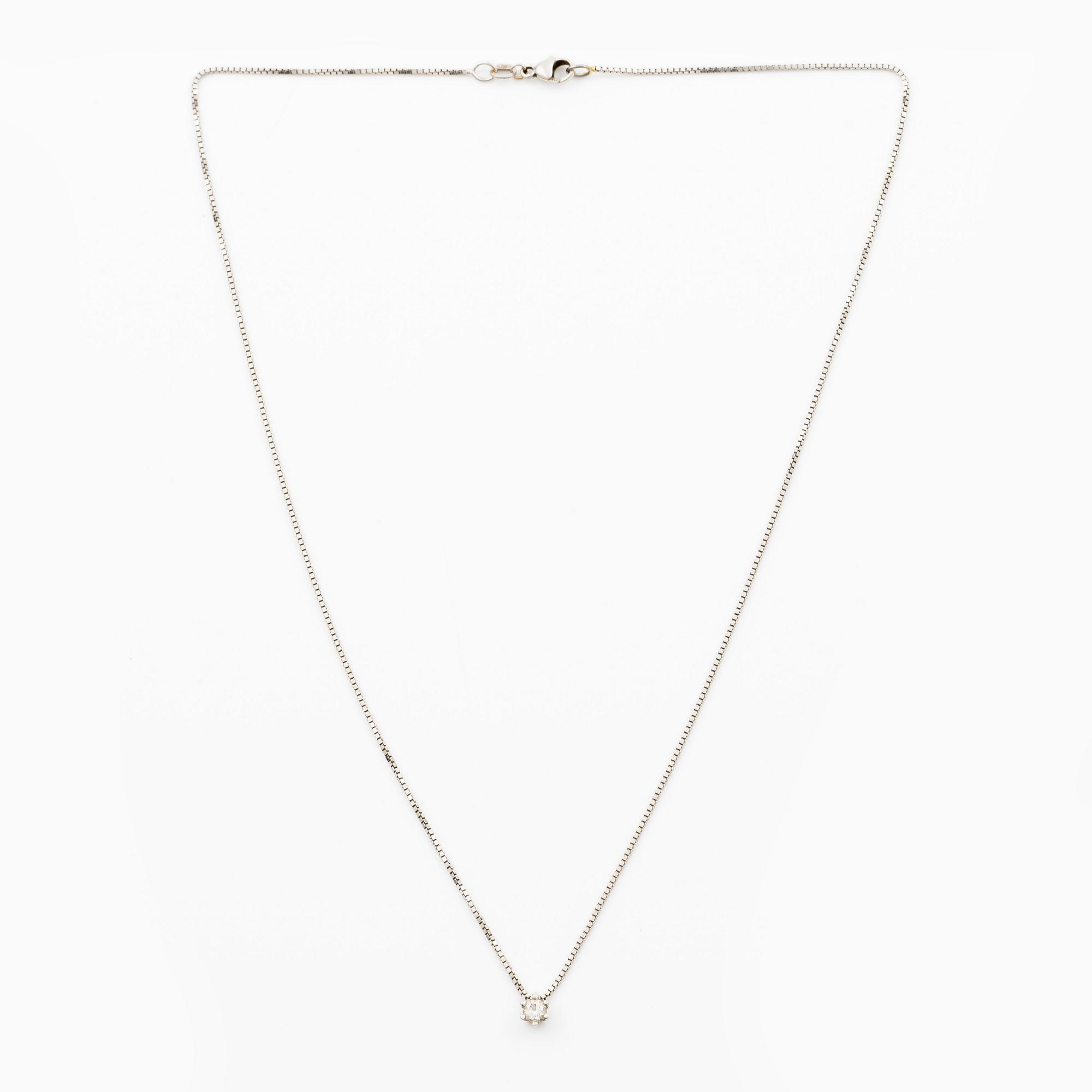 Pendant with chain, 18K white gold set with brilliant-cut diamond.