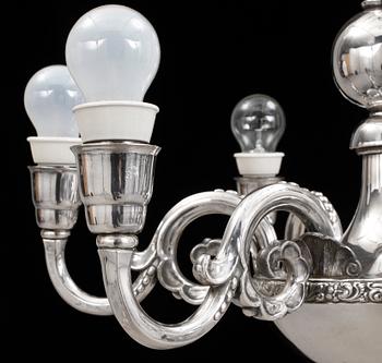 LJUSKRONA, nysilver. C.G. Hallberg, Stockholm, 1920-tal. H ca 90.