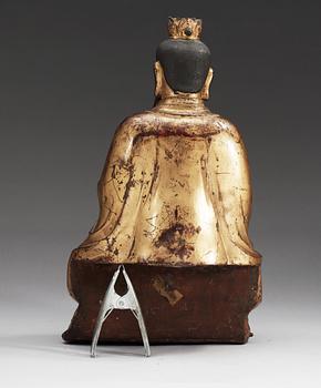 A gilt bronze figure of a High Daoist official, Ming dynasty.