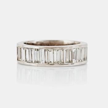 1262. A baguette-cut diamond ring. Total carat weight circa 3.00 cts.