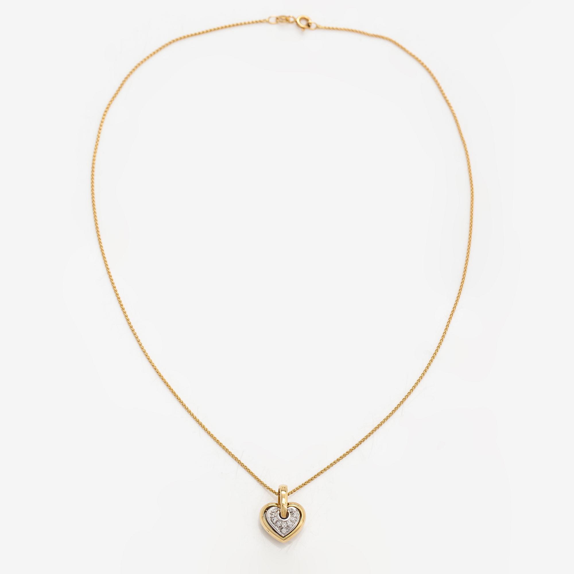 An 18K gold necklace with a heart shaped pendnat with diamonds ca. 0.09 ct in total.