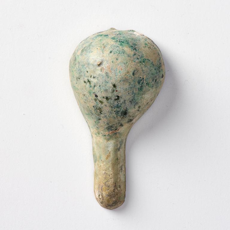 A painted pottery bell and a green glazed spoon, Han dynasty  (202 BC-220 AD).