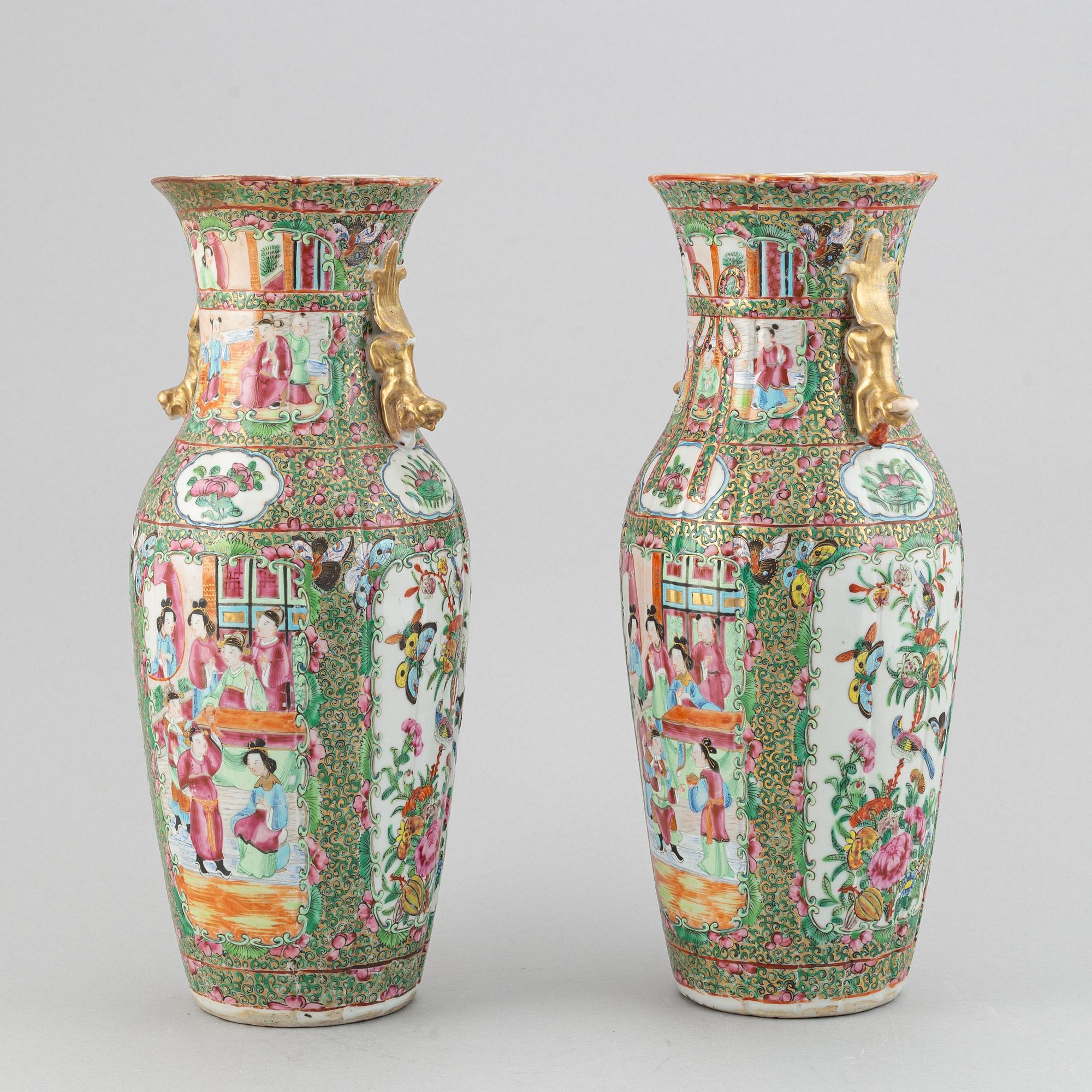 A pair of famille rose canton vases, Qing dynasty, late 19th century.