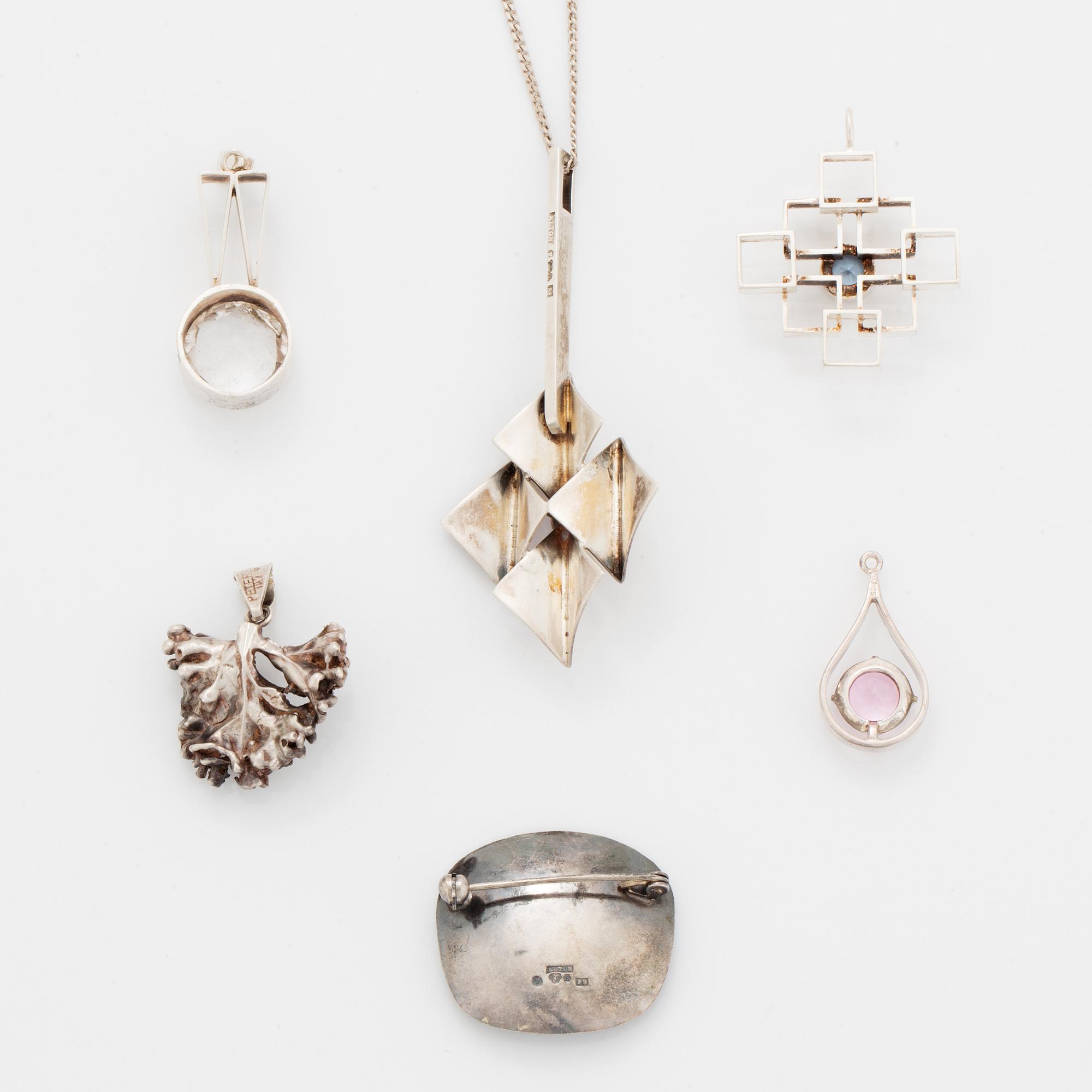 Five pendants and one brooch, silver.