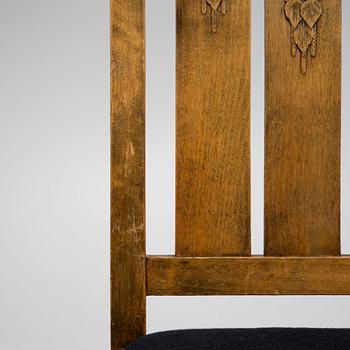 Carl Westman, attributed, a pair of stained birch wood chairs. Early 20th century.