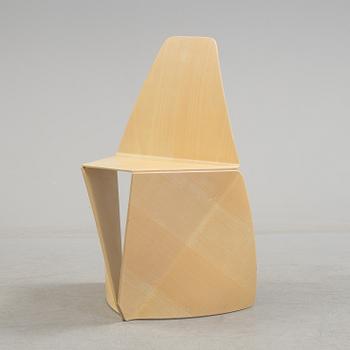 a "Trio" chair by Peter Karpf for Iform.