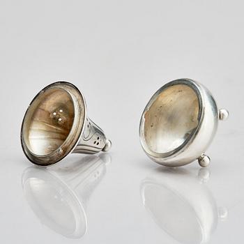 Georg Jensen, four sterling silver casters, design Harald Nilesen, Copenhagen 1933-44, one Copenhagen after 1945.