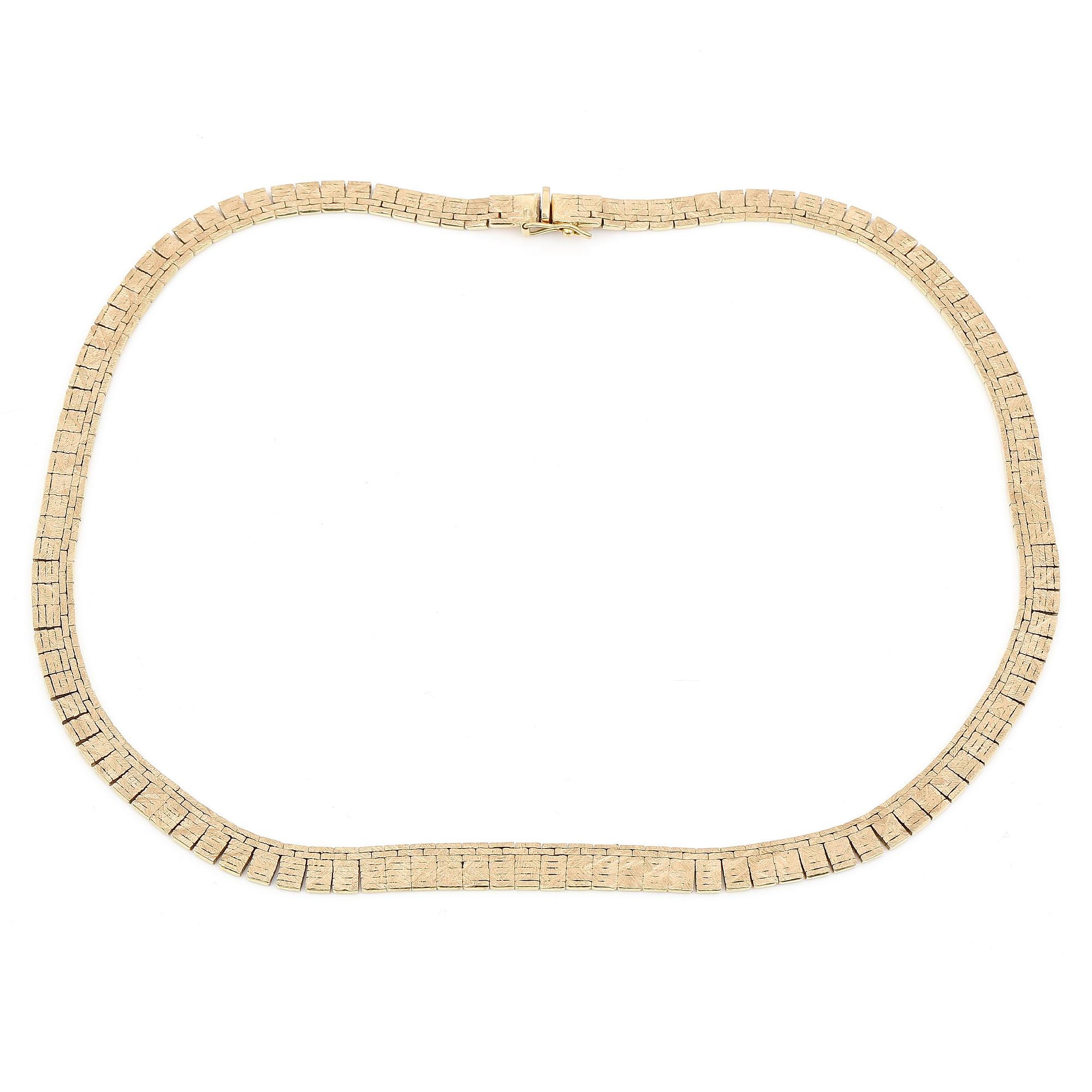 HALSBAND, 18K guld, 1900-talets andra hälft. Total vikt ca 43 g.