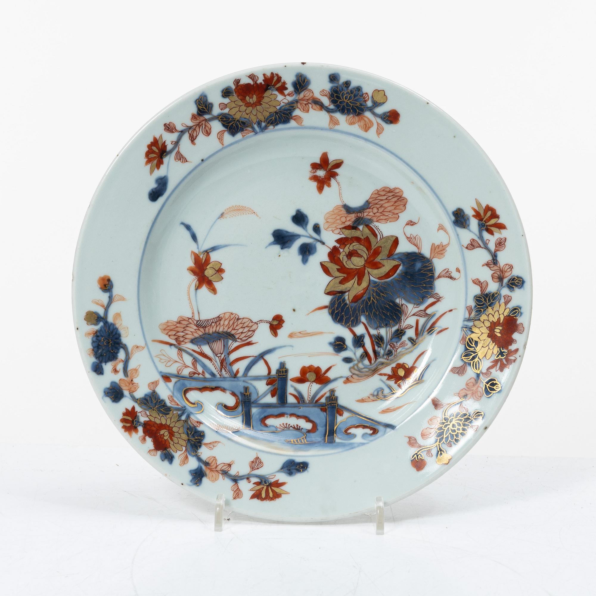 Seven export porcelain plates, China, Qing dynasty, 18th century.