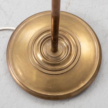 A brass floor lamp, Sweden, mid 20th century.