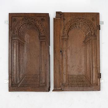 A pair of Baroque carved walnut doors, 17th/18th Century.