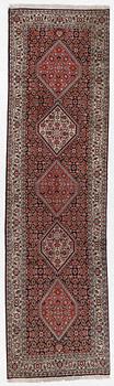 A Bidjar runner, a. 296 x 82 cm.