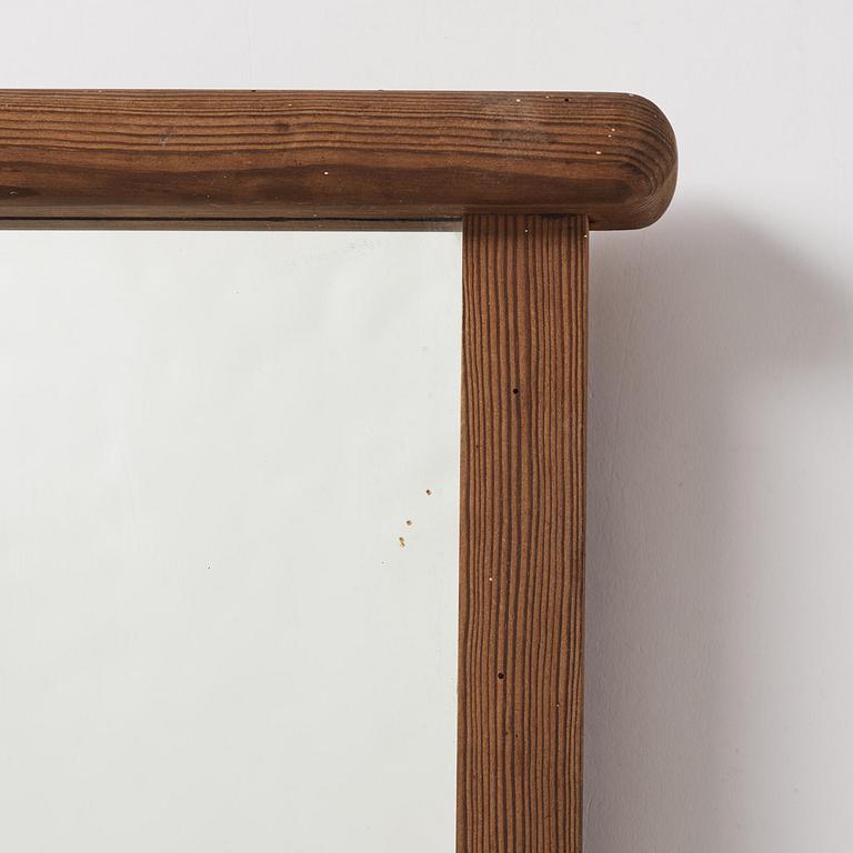 Axel Einar Hjorth, a stained pine "Sport" wall mirror with a shelf, Nordiska Kompaniet, Sweden, 1930s.