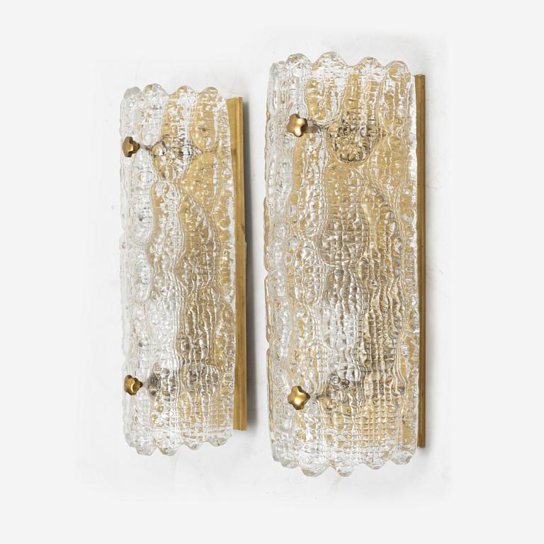 Carl Fagerlund, a pair of brass and glass wall lights and a ceiling light, Orrefors.