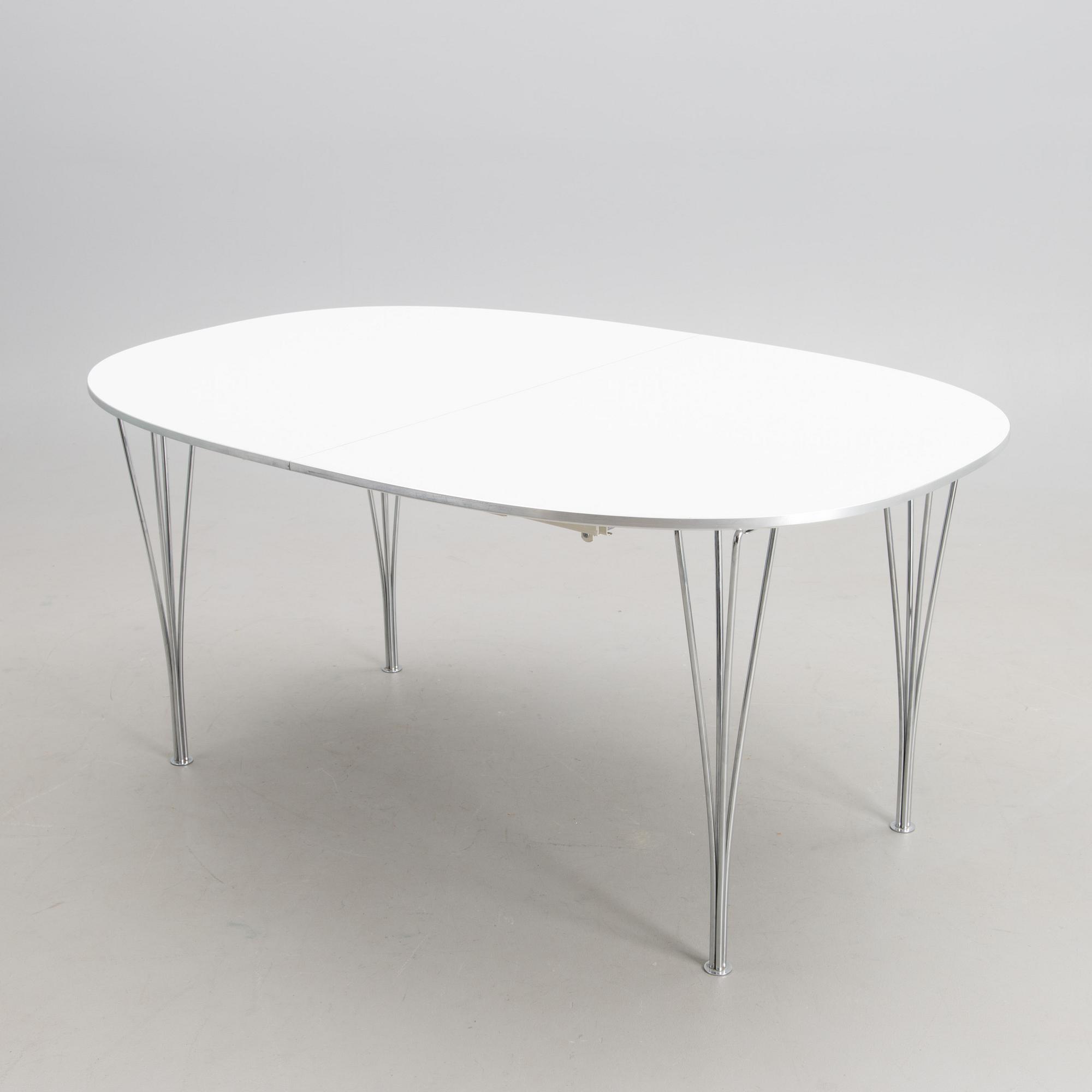 BRUNO MATHSSON AND PIET HEIN, a 'Superellips' dining table from Fritz Hansen, 1993.