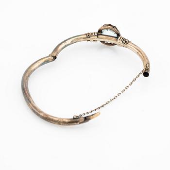 Arm ring, silver with aquamarine.