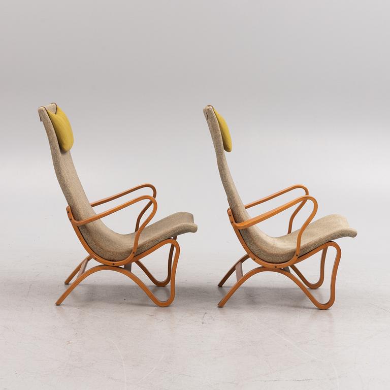 A pair of birch tree easy chairs. Mid 20th century.