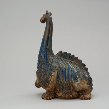 An Åke Holm stoneware figure of a dynosaur, Höganäs 1940's.