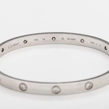 Cartier, "Love bracelet" an 18K white gold bracelet with diamonds ca. 0.96 ct in total. Marked Cartier, 19, SD4387.